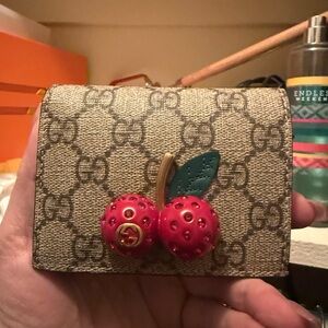 Gucci Beige Monogram Wallet with Red Cherry Detail